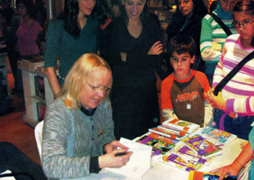 Elsa-firmando